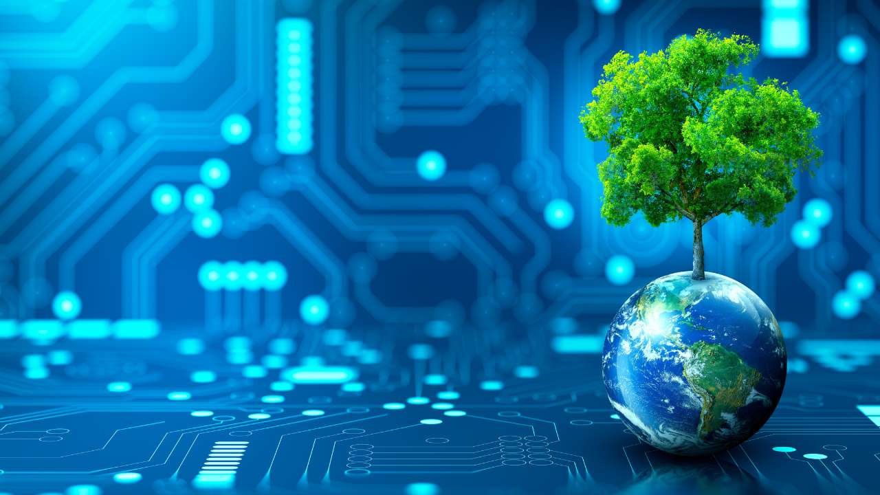 A imagem é de uma árvore crescendo na Terra com um fundo abstrato azul. Ela representa conceitos relacionados à tecnologia ambiental, Dia da Terra, economia de energia, sustentabilidade, ética corporativa e proteção ambiental. A imagem também inclui elementos fornecidos pela NASA.